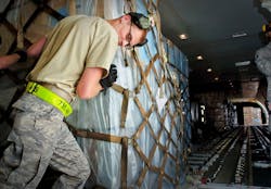 Staff Sgt. Dan Lackey, a ramp services shift supervisor loads cargo onto a plane at Yokota Air Base, Japan. Balancing the cargo on transport planes is paramount to ensuring the safety of the aircraft.