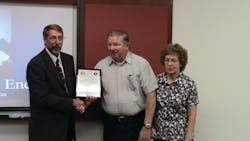 Scott Landorf of the DuPage FSDO presents Robert Lawson with the Charles Taylor Master Mechanic Award. Scott Landorf of the DuPage FSDO presents Robert Lawson with the Charles Taylor Master Mechanic Award.