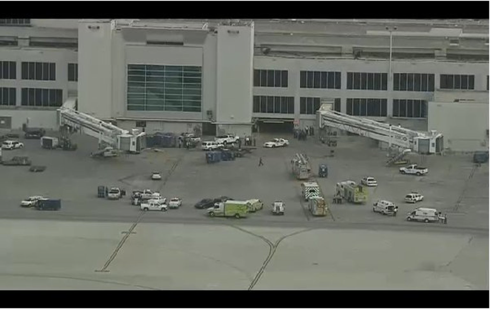 The incident began around 3:30 p.m. when a 3-ounce bottle, marked as shampoo, spilled from a passenger's bag that was on a loading ramp near the southeast gate of the airport, according to Miami-Dade Fire Rescue.