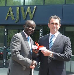 Jared Ajwanga receiving his Bursary from Boris Wolstenholme - CEO, AJW Aviation, at the Company&rsquo;s new Group headquarters near Gatwick Airport