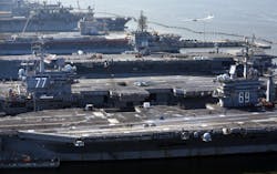 If Congress does nothing to mitigate $500 billion in across-the-board defense cuts planned over the next decade, several analysts say, reducing the number of carrier strike groups from 11 is more than just a possibility -- it&apos;s almost assured.