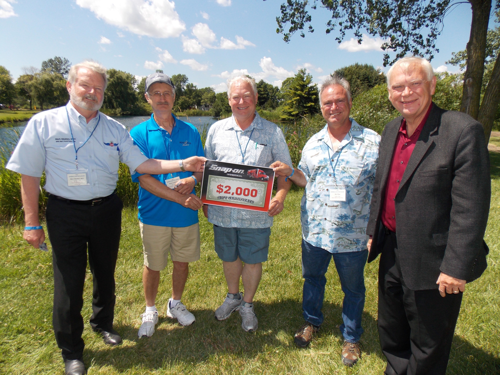 L/R: Mark Madden, Anchorage, Alaska, Federal Aviation Administration Safety Team Representative of the Year; Bruce Lundquist, Willis, Mich., Avionics Technician of the Year; Dean Eichholz, Soldotna, Alaska, Certified Flight Instructor of the Year; Bill Fifles, Honolulu, Hawaii, Aviation Maintenance Technician of the Year; Pat McDevitt, Manager Business Development, Snap-on Industrial.