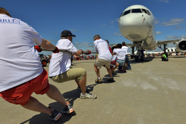 This year, 70 teams took part in the the Plane Pull charity event competing to pull a jet plane 12 feet in the shortest time.