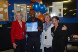 Members of MIA's Rewards and Recognition Committee and American Airlines co-workers surprised Allen on the job on September 25 with a recognition celebration and presented him with his Employee of the Month certificate of appreciation. Members of MIA's Rewards and Recognition Committee and American Airlines co-workers surprised Allen on the job on September 25 with a recognition celebration and presented him with his Employee of the Month certificate of appreciation.