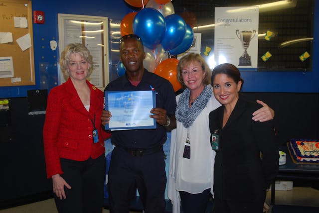 Members of MIA&apos;s Rewards and Recognition Committee and American Airlines co-workers surprised Allen on the job on September 25 with a recognition celebration and presented him with his Employee of the Month certificate of appreciation.