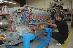 Juan Rodgriguez, a Redstone College student, works on a reciprocating engine, a core part of the A&P training. Juan Rodgriguez, a Redstone College student, works on a reciprocating engine, a core part of the A&P training.