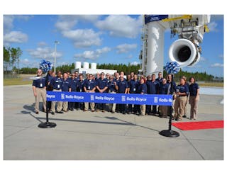 Rolls-Royce Outdoor Jet Engine Test Facility employees stand in front of the new, second test stand which was dedicated today. The stand recently began running a production Trent XWB &ndash; and on Oct. 15, 2013 &ndash; both stands were operational for the first time concurrently.