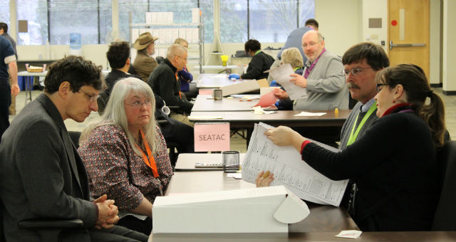 King County elections officials recounted ballots by hand Monday, at the request of opponents of SeaTac Proposition 1, and announced it had identified 'no surprises' that would change the initial tally of the Nov. 5 vote.