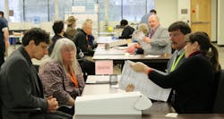 King County elections officials recounted ballots by hand Monday, at the request of opponents of SeaTac Proposition 1, and announced it had identified &apos;no surprises&apos; that would change the initial tally of the Nov. 5 vote.