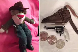 Owner says doll's 2-inch gun weighs less than an ounce. Its trigger and hammer move, but the barrel is solid. Owner says doll's 2-inch gun weighs less than an ounce. Its trigger and hammer move, but the barrel is solid.