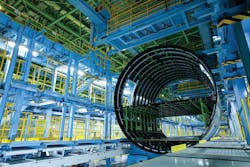 B787 fuselage sections, fixtures, and tooling during production. B787 fuselage sections, fixtures, and tooling during production.