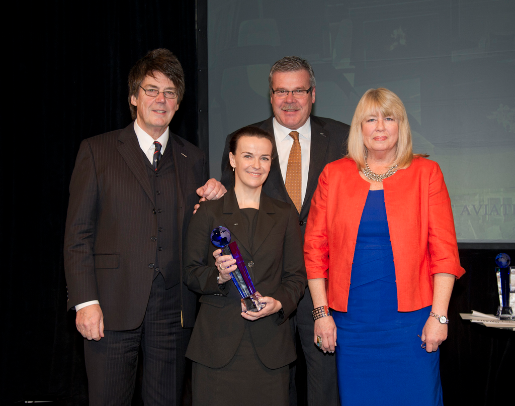 BBC Broadcaster Mike Read; Elisabeth Harvey, Manager, Jet Aviation Basel Design Studio; Ruedi Kraft, Vice President, Market Development & Completions Sales, Jet Aviation Basel; and Interisoft sponsor Renee Mascari.