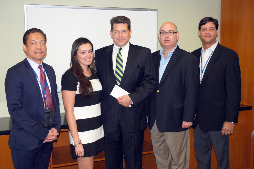 Miami-Dade Aviation Director Emilio T. Gonz&aacute;lez (second from right), TSA Federal Security Director for MIA Mark Hatfield (center) and representatives from Duty Free Americas, Global Miami, J.V. and Master ConcessionAir, who contributed to the memorial fund.