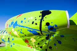 The paint team very carefully and precisely taped these seemingly careless paint splotches to give the aircraft an organized chaos look. The paint team very carefully and precisely taped these seemingly careless paint splotches to give the aircraft an organized chaos look.