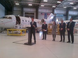 Dr. Eric Hoskins, Ontario, Canada Minister of Economic Development, Trade and Employment announces A $1.2 Million CAD grant for Flying Colours Corp., specialists in aircraft completion, maintenance and refurbishments, for the expansion of its Peterborough, Ontario facility. Pictured: Hoskins; Ontario Minister of Rural Affairs and Peterborough MPP Jeff Leal; Kate Ahrens, Flying Colours VP Corp Development and Interior Design; John Gillespie, Flying Colours President and CEO; and Darryl Bennett, Mayor of Peterborough. Dr. Eric Hoskins, Ontario, Canada Minister of Economic Development, Trade and Employment announces A $1.2 Million CAD grant for Flying Colours Corp., specialists in aircraft completion, maintenance and refurbishments, for the expansion of its Peterborough, Ontario facility. Pictured: Hoskins; Ontario Minister of Rural Affairs and Peterborough MPP Jeff Leal; Kate Ahrens, Flying Colours VP Corp Development and Interior Design; John Gillespie, Flying Colours President and CEO; and Darryl Bennett, Mayor of Peterborough.