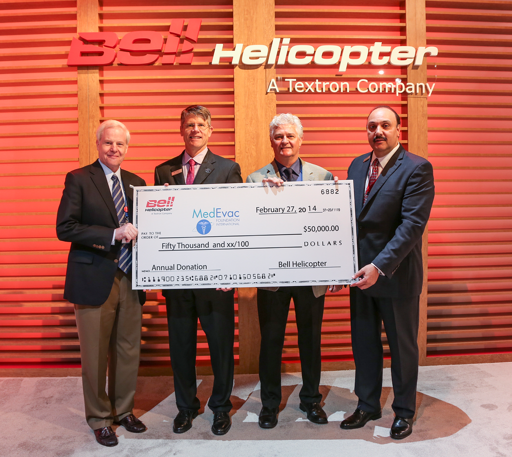 Photo (from L-R): Rick Sherlock, president and CEO, Medevac Foundation International; John Garrison, president and CEO, Bell Helicopter; Dr. Kevin Hutton; chairman, MedEvac Foundation International; and Danny Maldonado, executive vice president of sales and marketing, Bell Helicopter.