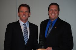 Satcom Direct President David Greenhill and Vice President for Business Development Dale Holland accept Via Satellite's Vertical Impact for Military Excellence Award. Satcom Direct President David Greenhill and Vice President for Business Development Dale Holland accept Via Satellite's Vertical Impact for Military Excellence Award.