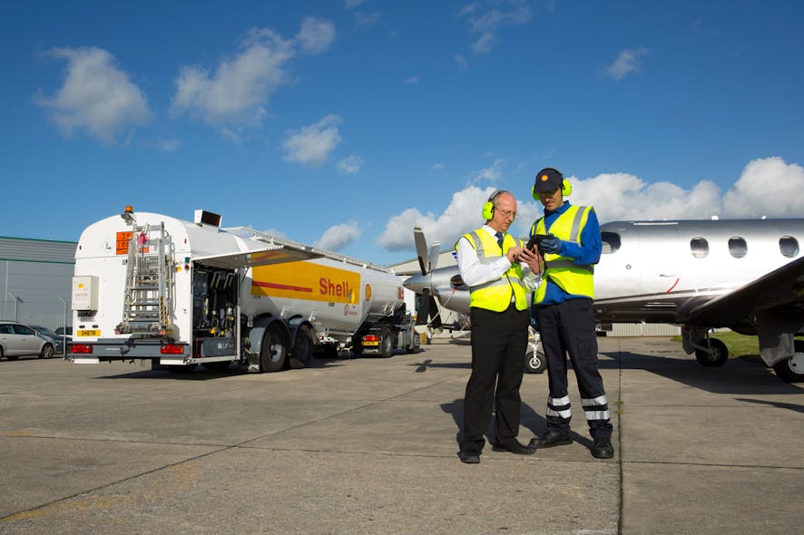 Shell Aviation staff finalising a refueling transaction