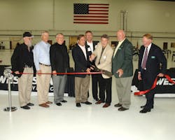 Ceremonial ribbon cutting to commemorate the opening of the new facility. Pictured, from left to right, Samuel Haycraft, Cofounder/Executive Vice President, West Star Aviation Inc.; Michael Durst, Cofounder/Executive Vice President Inc., West Star Aviation; Robert Rasberry, CEO, West Star Aviation Inc.; Eric Kujawa, General Manager (ALN), West Star Aviation Inc.; Jim Swehla, Cofounder/Executive Vice President, West Star Aviation Inc.; Darrell McGibany, Chairman, St. Louis Regional Airport Authority Board of Commissioners; Steve Kochan, Secretary, St. Louis Regional Airport Authority Board of Commissioners, St. Louis Regional Airport Authority; Dave Miller, Manager, St. Louis Regional Airport. Ceremonial ribbon cutting to commemorate the opening of the new facility. Pictured, from left to right, Samuel Haycraft, Cofounder/Executive Vice President, West Star Aviation Inc.; Michael Durst, Cofounder/Executive Vice President Inc., West Star Aviation; Robert Rasberry, CEO, West Star Aviation Inc.; Eric Kujawa, General Manager (ALN), West Star Aviation Inc.; Jim Swehla, Cofounder/Executive Vice President, West Star Aviation Inc.; Darrell McGibany, Chairman, St. Louis Regional Airport Authority Board of Commissioners; Steve Kochan, Secretary, St. Louis Regional Airport Authority Board of Commissioners, St. Louis Regional Airport Authority; Dave Miller, Manager, St. Louis Regional Airport.