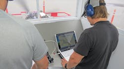 Students analyzing faults with a laptop on a FADEC diesel engine. Students analyzing faults with a laptop on a FADEC diesel engine.