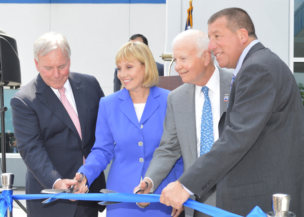 FlightSafety International celebrated the grand opening of its newly expanded and renovated Learning Center in Teterboro, New Jersey today with Customers, FlightSafety Teammates and other special guests. From left to right: Greg Wedding, Vice President, Teammate Development & Teterboro Center Manager, FlightSafety; New Jersey Lt. Governor Kim Guadagno; Bruce Whitman, President & CEO, FlightSafety; and Dennis Vaccaro, Mayor of Moonachie, NJ.