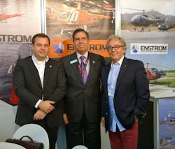 From left to right: Roland Vanhees of DSA, Orlando Alaniz from Enstrom, and Tom&aacute;&scaron; Such&aacute;nek of DSA at Farnborough.