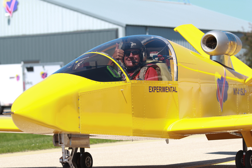 Test pilot Bob Carlton taxi's back to the Sonex ramp with a big 'thumbs up' after first flight of SubSonex Personal Jet model JSX-2.