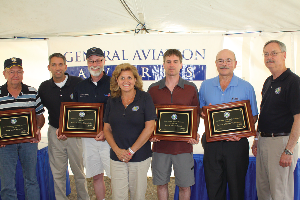 The 2014 General Aviation Awards Winners: Max Loyd Burnette, Richard Loren Stowell, Jr., David Brian Kocak, and Howard William Wolvington with FAA representatives.