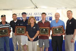 The 2014 General Aviation Awards Winners: Max Loyd Burnette, Richard Loren Stowell, Jr., David Brian Kocak, and Howard William Wolvington with FAA representatives.
