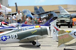 Remote control planes and full size aircraft steal the spotlight at the Biggest Little Airshow In Hawaii on Ford Island in Pearl Harbor. (PRNewsFoto/Pacific Aviation Museum Pearl...)