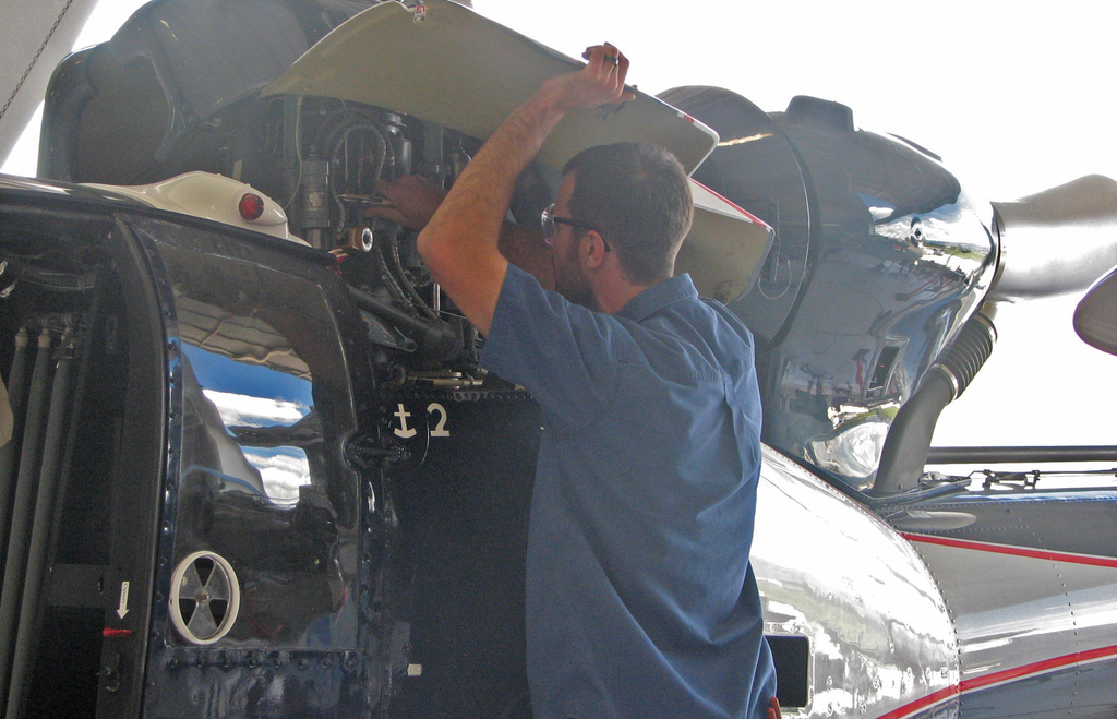A Trine Aerospace & Defense mechanic performs a post flight engine inspection of an Airbus Gazelle SA341F2 helicopter at the company's 30,000 square foot commercial modification facility at Colorado Springs (KCOS) Airport. Trine has received certification from the Federal Aviation Administration (FAA) that enables it to perform maintenance, repair and overhaul services on rotor-wing aircraft.