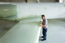 After each application of paint the entire aircraft surface is thoroughly inspected for any minor imperfections that could affect the quality of the final product. After each application of paint the entire aircraft surface is thoroughly inspected for any minor imperfections that could affect the quality of the final product.