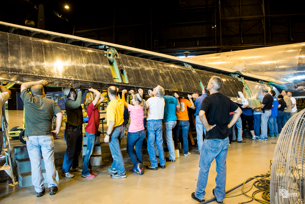 Resembling the original technique used in the Boeing factory decades ago, only organized manpower was utilized to lift and install the flaps.