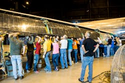 Resembling the original technique used in the Boeing factory decades ago, only organized manpower was utilized to lift and install the flaps. Resembling the original technique used in the Boeing factory decades ago, only organized manpower was utilized to lift and install the flaps.