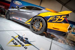 The one-of-a-kind 2015 Ford Mustang inspired by the F-35 Lightning II fighter jet sold for $200,000 at the Gathering of Eagles live auction at EAA AirVenture Oshkosh 2014 (EAA photo). The one-of-a-kind 2015 Ford Mustang inspired by the F-35 Lightning II fighter jet sold for $200,000 at the Gathering of Eagles live auction at EAA AirVenture Oshkosh 2014 (EAA photo).