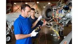 Vector technicians work on aircraft engine Vector technicians work on aircraft engine