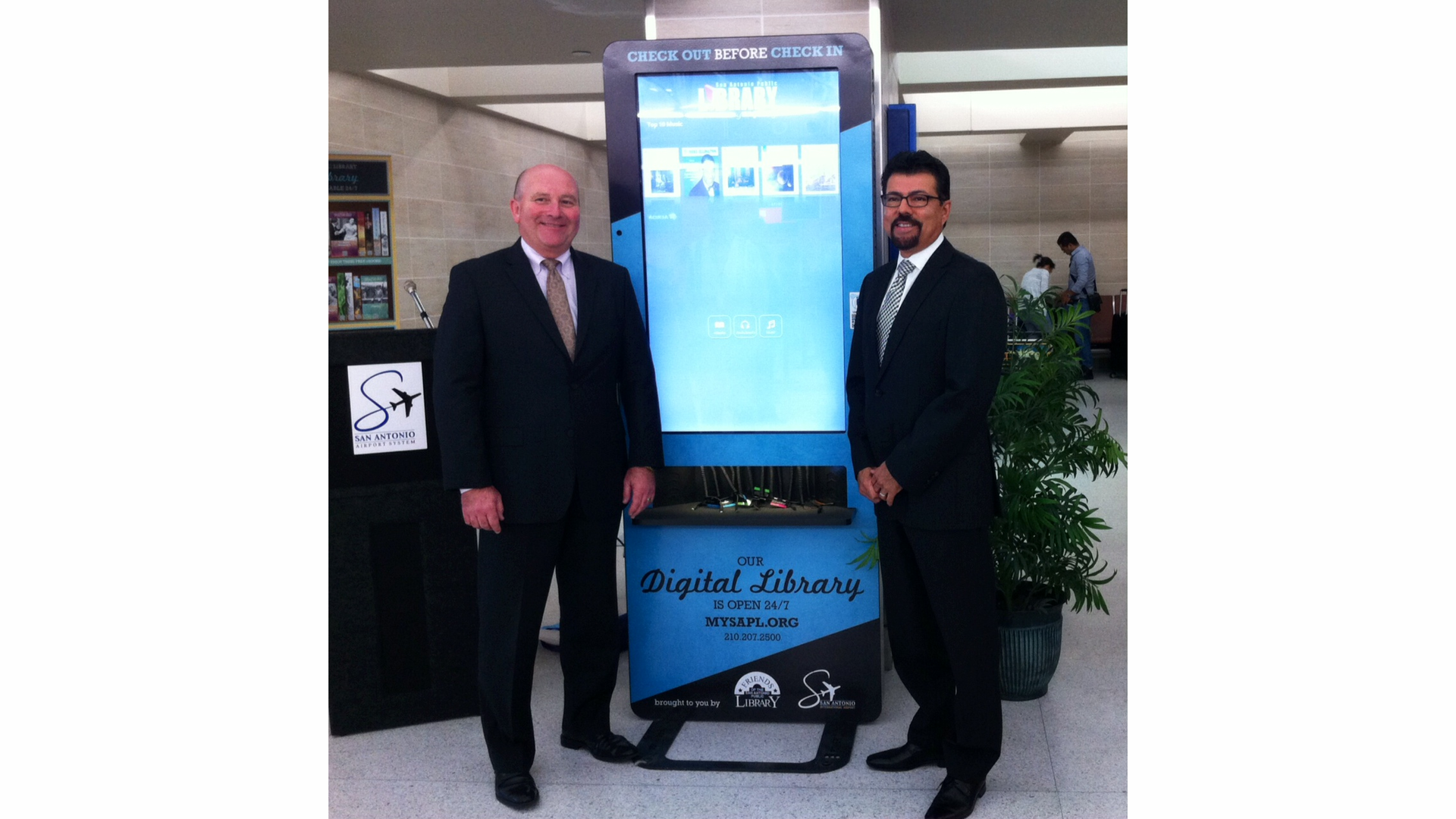 Left: Frank R. Miller, Aviation Director San Antonio Airport System and Right: Ramiro Salazar, San Antonio Public Library Director