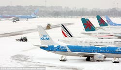 The plane was waiting to be deiced at Manchester Airport, but many complained there only seemed to be one vehicle equipped to remove snow from all the planes and some claimed it broke down