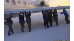 A passenger was quoted as saying that they had been asked to help, and had pushed it 'about 5 meters, maybe more.' But the local authorities have cast doubt on the story. A passenger was quoted as saying that they had been asked to help, and had pushed it 'about 5 meters, maybe more.' But the local authorities have cast doubt on the story.