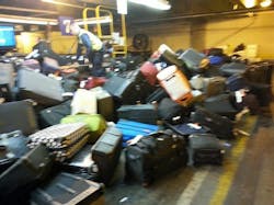 United's luggage handling woes surfaced after the termination of its contract with SkyWest Airlines, effective Dec. 4. United's luggage handling woes surfaced after the termination of its contract with SkyWest Airlines, effective Dec. 4.