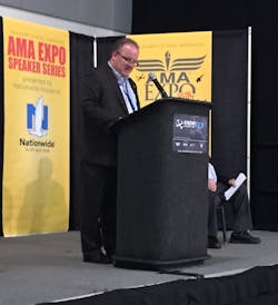 Sean Elliott, EAA VP of advocacy and safety, speaking at Academy of Model Aeronautics convention announcement on Jan. 9, 2015, at Ontario, CA. (Jennifer Hall photo)