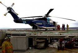 A Cougar Helicopters Sikorsky S-92 helicopter is seen on the helideck of an offshore oil rig on the Grand Banks of Newfoundland in this undated file picture. A Cougar Helicopters Sikorsky S-92 helicopter is seen on the helideck of an offshore oil rig on the Grand Banks of Newfoundland in this undated file picture.