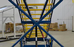 Crew access stairs with automatically locking X-braces increase safety by eliminating a task that could be forgotten by inexperienced ground crews.