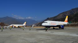 The entire range of carriers serving Bhutan is on display on the tarmac at Paro.