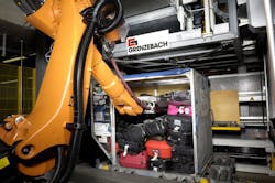 In Amsterdam’s Schiphol airport, six robotic arms automatically load baggage onto carts while entertaining passengers who watch them work. In Amsterdam’s Schiphol airport, six robotic arms automatically load baggage onto carts while entertaining passengers who watch them work.