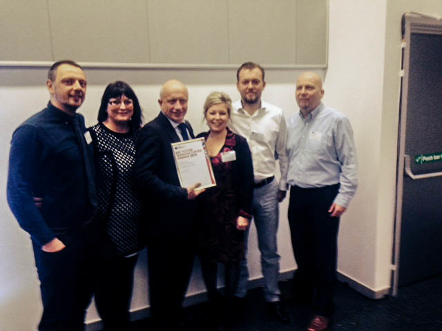 Semmco Team accepting the EEF Outstanding Export Award: from left to right, Ludovic Betremieux, Senior Design Engineer; Jenny Gore, Accounts; Stuart McOnie, General Manager; Diane Hall, Buyer Planner; Tomasz Rutkowski, Team Leader, Peter Heighes, Intern.