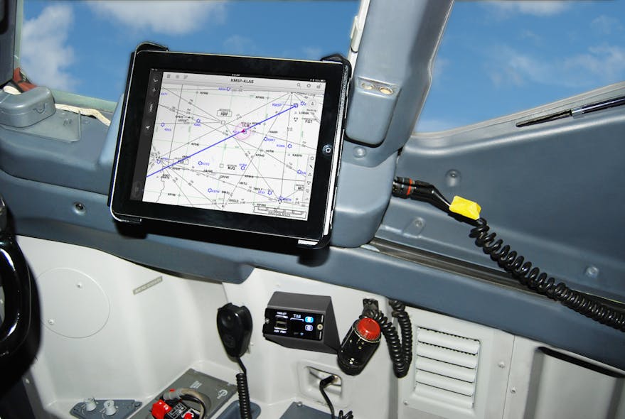 UTC Aerospace Systems Tablet Interface Module (TIM&trade;) installed on a Boeing 737NG wirelessly connected to Apple iPad&circledR; operating Jeppesen&rsquo;s Mobile FliteDeck Pro application.