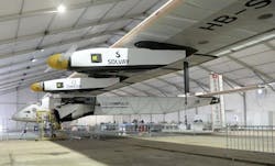 A support team member works on Solar Impulse 2, the world's only solar powered aircraft, at Sardar Vallabhbhai Patel International Airport in the Indian city of Ahmedabad on March 17, 2015. A support team member works on Solar Impulse 2, the world's only solar powered aircraft, at Sardar Vallabhbhai Patel International Airport in the Indian city of Ahmedabad on March 17, 2015.