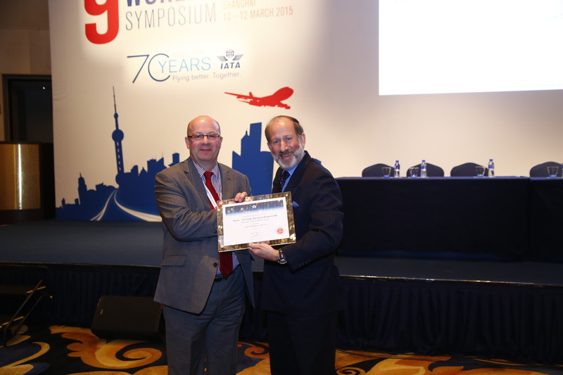 Rupert Batstone, VP Business Support Swissport Cargo Services, receiving the certificate at the World Cargo Symposium in Shanghai in March 2015.