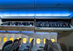 Boeing also moved the lower edge of the bin down 2 inches, making it easier to reach. Boeing also moved the lower edge of the bin down 2 inches, making it easier to reach.